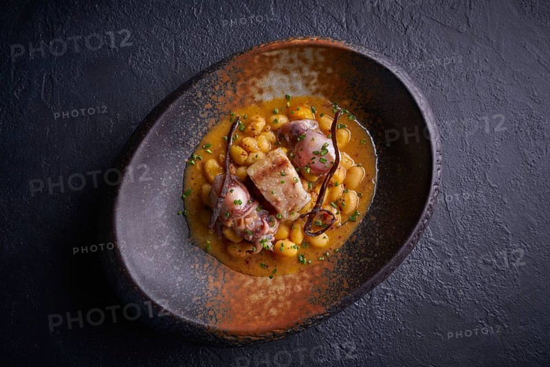 Judias pochas beans with calamari seafood and bacon