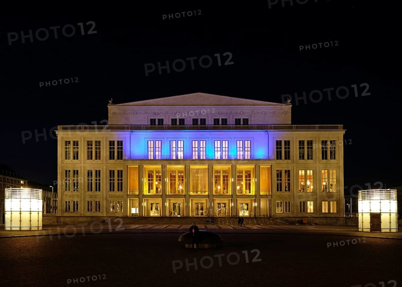 Leipzig Opera in the evening in the colours of Ukraine. Leipzig, Saxony, Germany, Europe