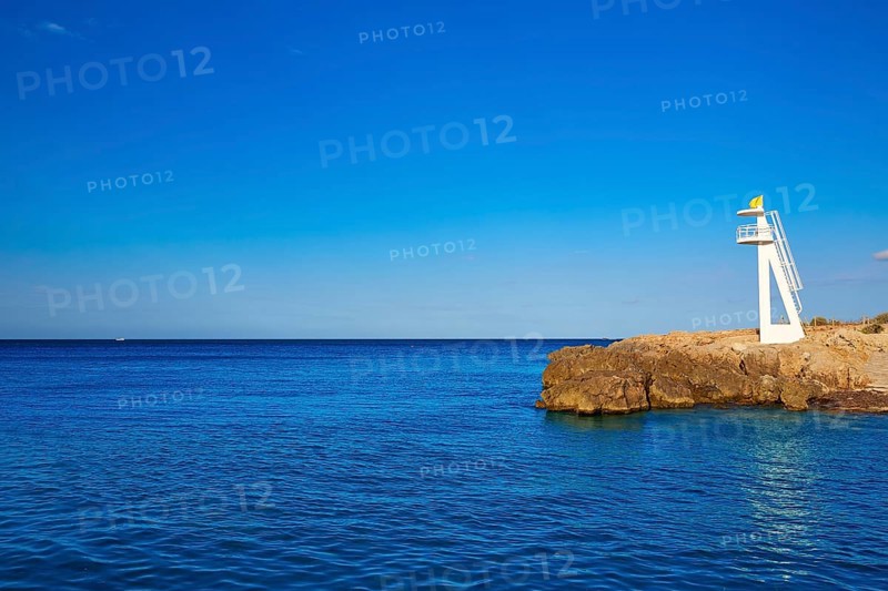 Denia Las Rotas Trampoli beach and tower in Mediterranean Spain Alicante
