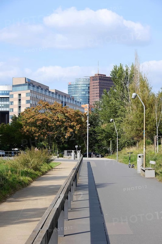Berlin, Germany, September 7, 2021, late summer view from Park am Gleisdreieck to Potsdamer Platz with Bahntower, Kollhof-Kower and buildings at linkstraße, Europe