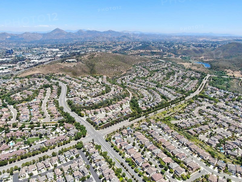 Aerial view of suburban neighborhood with big mansions in San Diego, California, USA. Aerial view of residential modern subdivision luxury house