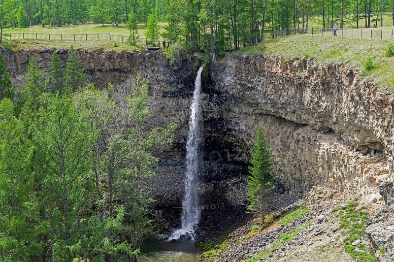 Waterfall Small Zhombolok. Immediately before the confluence of one of the streams of the Zhombolok River into the Oka Sayan River. The place is considered as sacred among the locals. Buryatia, Siberia, Russia, Europe