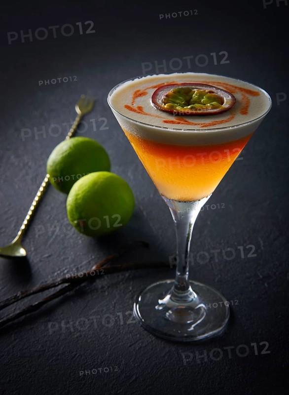 Mango cocktail with lemon and passion fruit maracuya