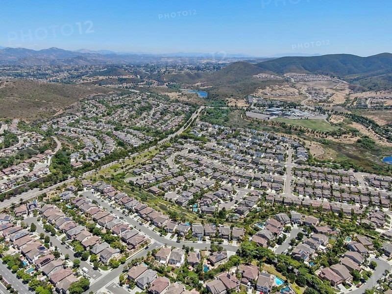 Aerial view of suburban neighborhood with big mansions in San Diego, California, USA. Aerial view of residential modern subdivision luxury house
