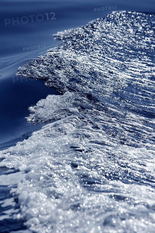 Blue water textures, waves foam, action, mediterranean sea