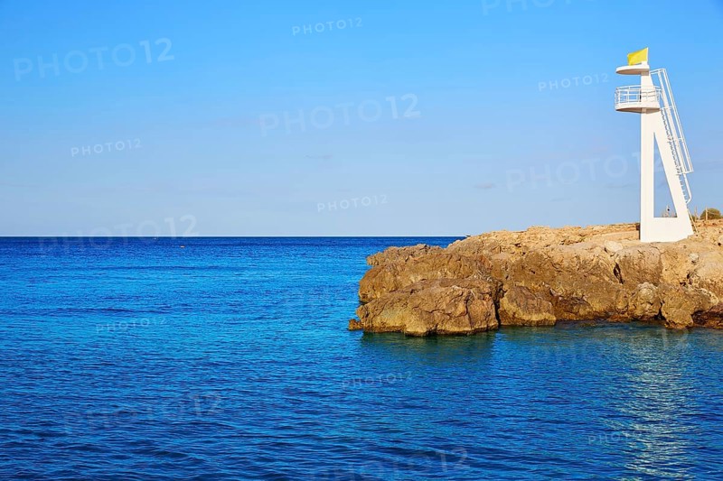 Denia Las Rotas Trampoli beach and tower in Mediterranean Spain Alicante