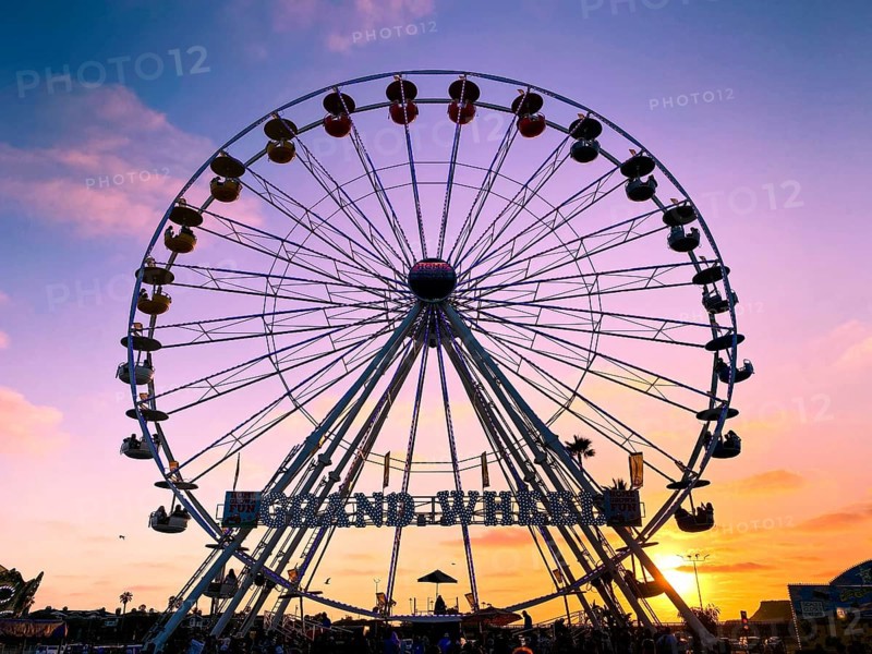 Ferris wheel, bottom view of a Ferris wheel during sunset. San DIego County Fair, California, USA. July 13th