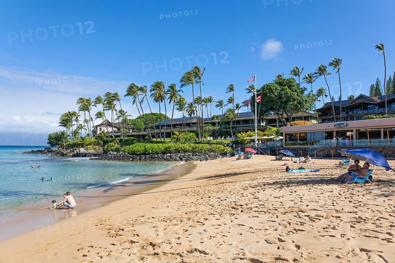 Tourist enjoying tropical beach with white sand and crystal clear water in Maui, Hawaii, USA, August 22nd, 2021, North America