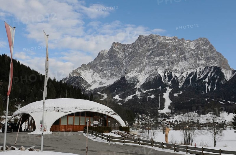 Tyrol: The Golf course covered with snow at the foot of Germany's highest mountain the Zugspitze seen from the austrian side