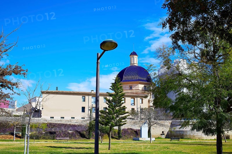 Valencia Turia river park with San Pio V museum dome in background at Spain