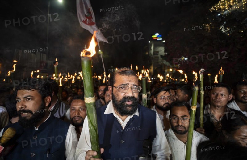 Members of the All Assam Students' Union (AASU) take part in a flaming torch rally and shout slogans to protest against the implementation of the Citizenship Amendment Act (CAA), on March 12, 2024 in Guwahati, Assam, India. The Citizenship Amendment Act (CAA), passed by the Indian Parliament in 2019, indeed grants expedited citizenship to specific religious minorities from Afghanistan, Bangladesh, and Pakistan who arrived in India on or before December 31, 2014. These religious minorities include Hindus, Sikhs, Buddhists, Jains, Parsis, and Christians, Asia