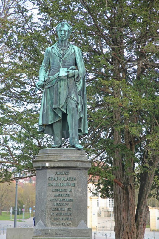Monument to the poet August von Platen-Hallermünde, sculpture, book, hold, inscription, bronze, verdigris, Schlossplatz, promenade, Ansbach, Middle Franconia, Franconia, Bavaria, Germany, Europe
