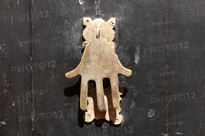 Door knocker as the hand of Fatima, Marrakech, Morocco, Africa