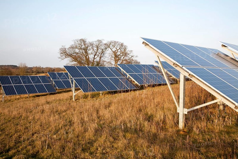 Solar array of photovoltaic panels in countryside at Bromeswell, Suffolk, England, United Kingdom, Europe