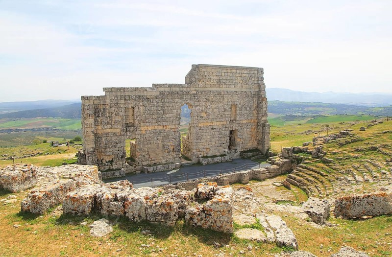 Remains of Roman theatre stage background wall and seating area, Acinipo Roman town site Ronda la Vieja, Cadiz province, Spain, Europe