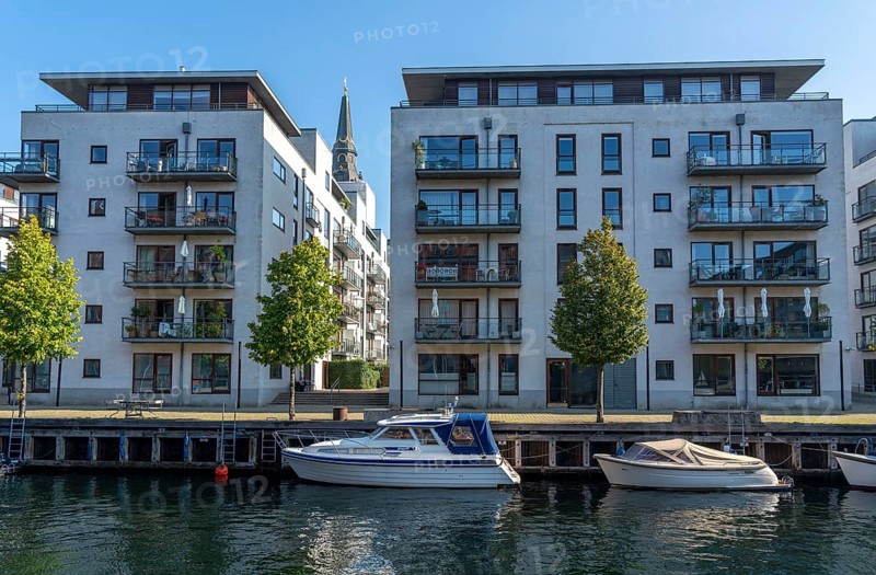 Christianshavns, old district, new residential buildings with jetty at Hammershøis Kaj, at the same time very lively and hip neighbourhood, crossed by many canals, with shops, pubs, living space, Copenhagen, Denmark, Europe