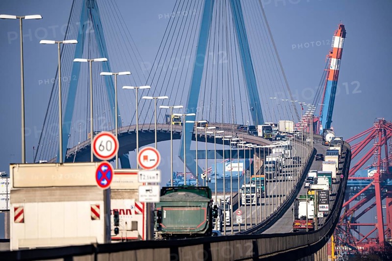 Traffic on the Köhlbrand Bridge in the port of Hamburg, spans the 325 m wide Köhlbrand, an arm of the Süderelbe, the bridge is over 3600 metres long, 53 metres above the water, piers 135 m high, more than 30, 000 vehicles use the B3 bridge daily, important connection to the port, it is dilapidated, to be rebuilt, Hamburg, Germany, Europe