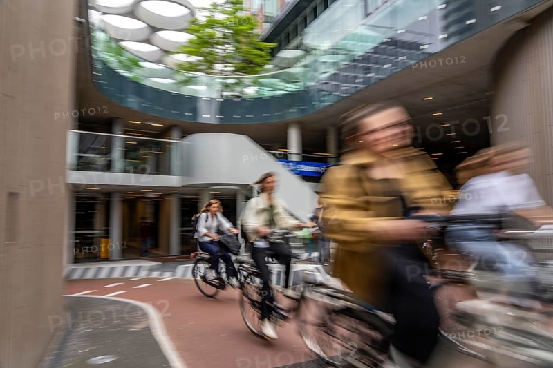 Entrance and exit of the bicycle car park at Utrecht Centraal station, Stationsplein, over 13, 000 parking spaces, considered the largest bicycle car park in the world, over 3 underground floors, Utrecht, Netherlands