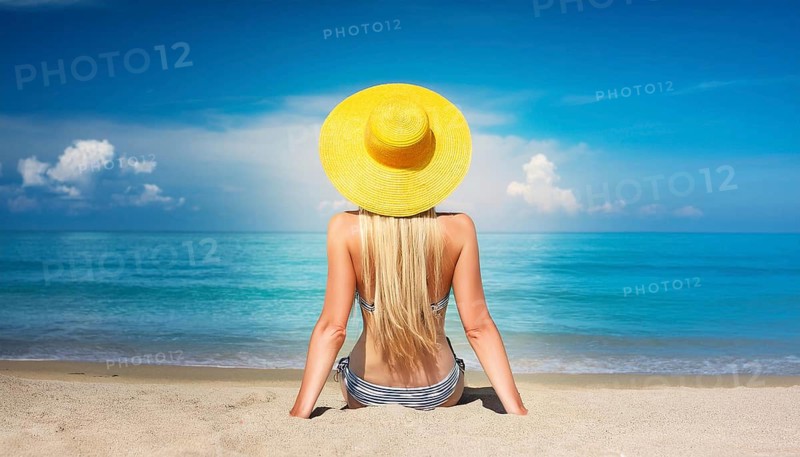 An attractive young woman on the beach in the Caribbean, Studio