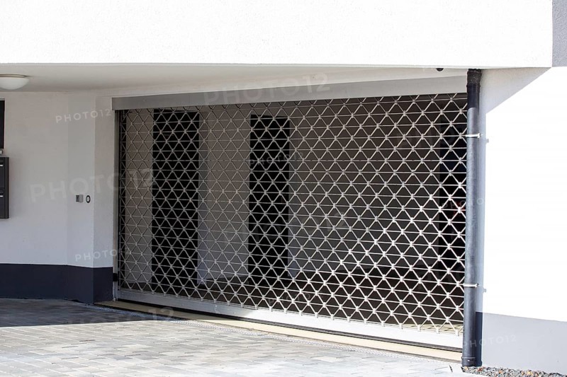Roller shutter door at the entrance to the underground car park of a residential complex
