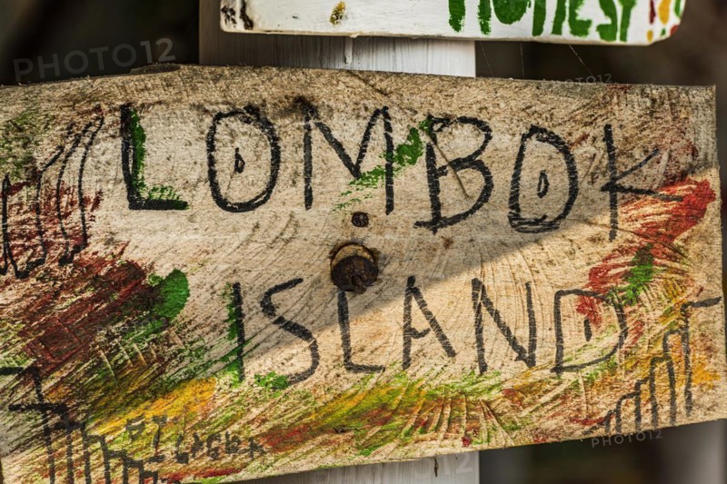 Wooden sign, hand-lettered, holiday, travel, exotic, tourism, handmade, Asian, Lombok, Indonesia, Asia