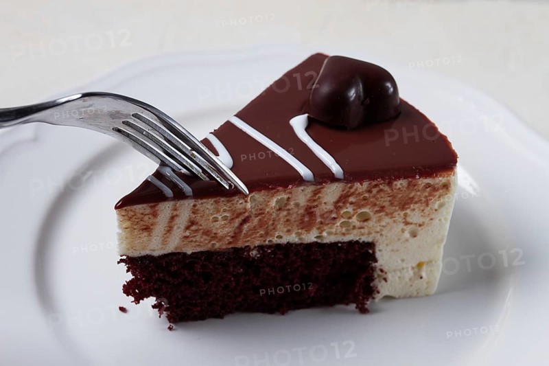 Slice of cake, bird's milk, chocolate sponge cake with souffle, sweet dessert, on a white plate, close-up, horizontal, no people