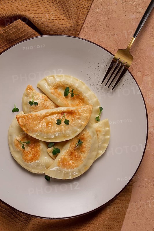 Pierogi, a traditional dish of Polish cuisine, dumplings, top view, close-up, no people