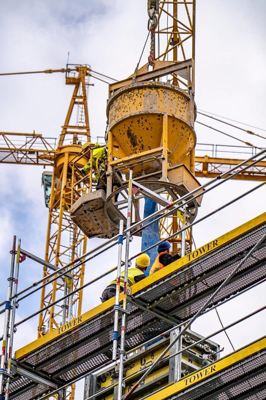 Concreting work on a construction site, new construction of a high-rise office building, facade of the shell, scaffolding, Cologne, North Rhine-Westphalia, Germany, Europe