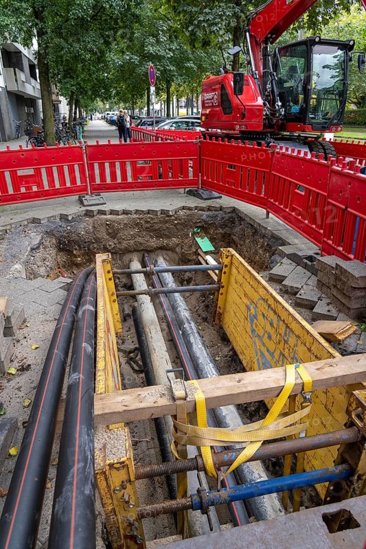 Construction site, excavation pit, work on supply lines, various types, electricity, water, gas, communication, in Düsseldorf North Rhine-Westphalia, Germany, Europe