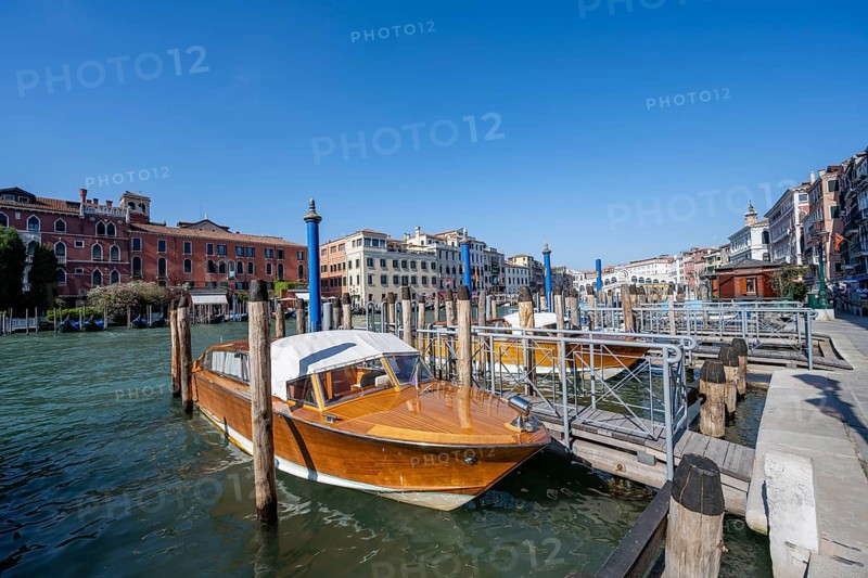 Water taxi at a jetty on the Grand Canal, Venice, Veneto, Italy, Europe