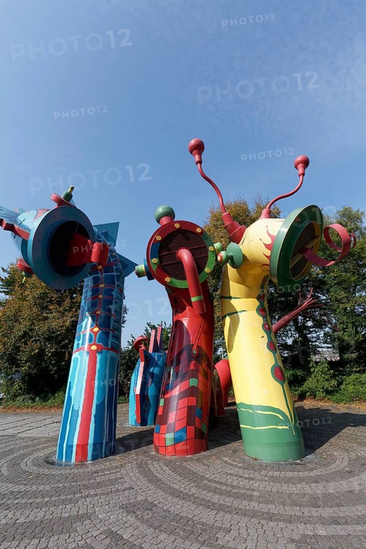 Sculpture of the Nessy family in bright colours, sea monster, aeration structure for Düsseldorf's urban drainage system, Düsseldorf, North Rhine-Westphalia, Germany, Europe