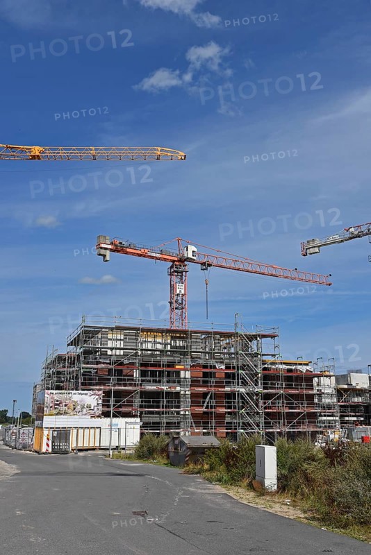 Europe, Germany, Lower Saxony, New residential buildings, Apartment blocks, Shell construction, Scaffolding, Construction crane, Europe