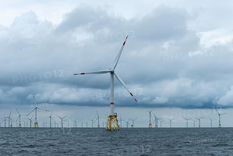 Offshore wind farm Nordsee Ost, operator RWE, north of Helgoland, German economic zone, wind turbines with jacket foundation structure, low swell, supply station, ship tug, Germany, Europe