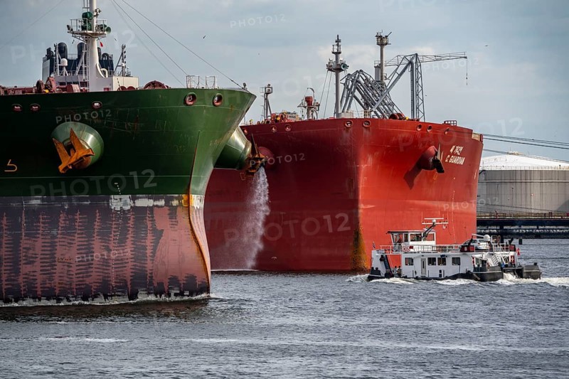 Petroleumhaven, Shell Terminal Europoort, crude oil tank farm, large tanks, and loading terminals for overseas and inland vessels, Europoort large tanker, crude oil tanker C.guardian being unloaded, refinery, Port of Rotterdam, Netherlands