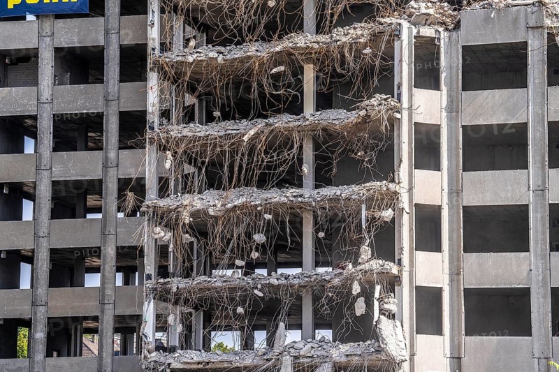 Demolition of a former office building, after complete gutting only the concrete parts of the façade remain, on Haroldstraße, Düsseldorf, North Rhine-Westphalia, Germany, Europe