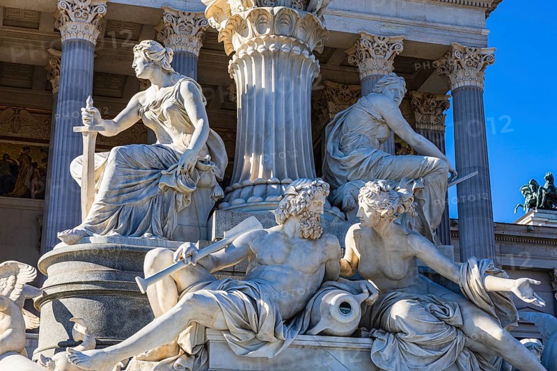 Stone figures of the Pallas-Athena fountain in front of the parliament building, Vienna, Austria, Europe