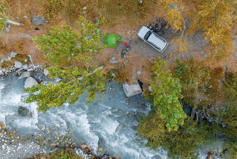 View down, aerial view, tent and camm, Ala Archa mountain stream, Ala Archa National Park, Khirgiz Ala-Too Mountains, Chuy Region, Kyrgyzstan, Asia