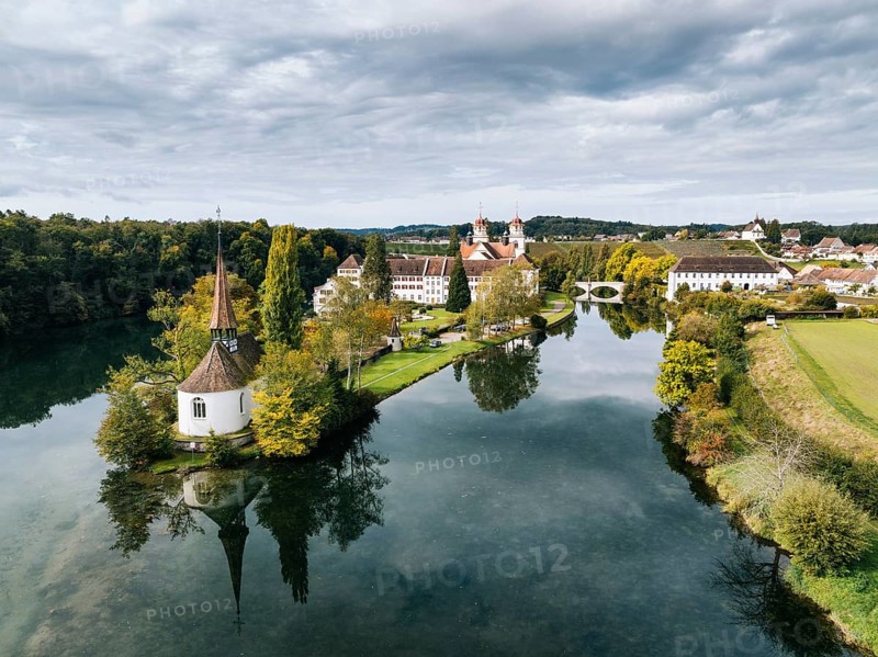 Aerial view of the former Benedictine abbey with the monastery church of St Mary and the pointed church of St Magdalena on the Rhine island of Rheinau, Andelfingen, Canton Zurich, Switzerland, Europe