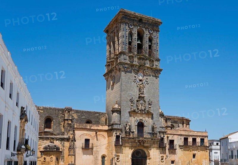 Majestic bell tower in the city centre with rich architectural decoration, Basilica Santa María de la Asunción, Church of Santa Maria de la Asuncion, Arcos de la Frontera, Province of Cádiz, Cadiz, Andalusia, Spain, Europe