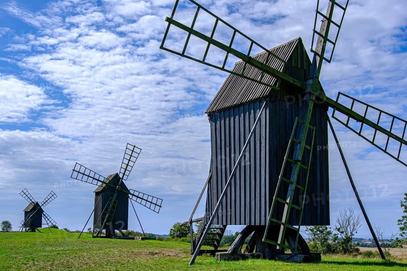 Three traditional historic windmills (Resmo väderkvarnar) in the village of Resmo on Öland, Kalmar län, Sweden, Scandinavia, Europe