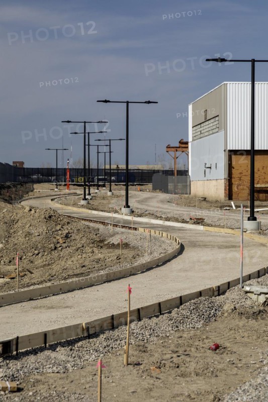 Detroit, Michigan, Construction of walkways on a section of the Joe Louis Greenway. When complete, the Greenway will be a 27.5-mile bicycle/walking trail that will circle much of the city and parts of Highland Park, Hamtramck, and Dearborn. This section was formerly a railway