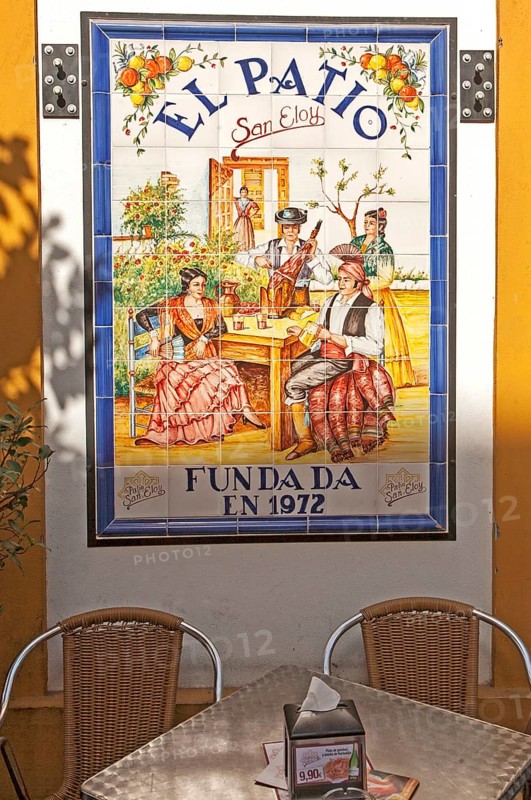 Ceramic tile picture of traditional folk musicians at El Patio restaurant, Triana district, Seville, Spain, Europe