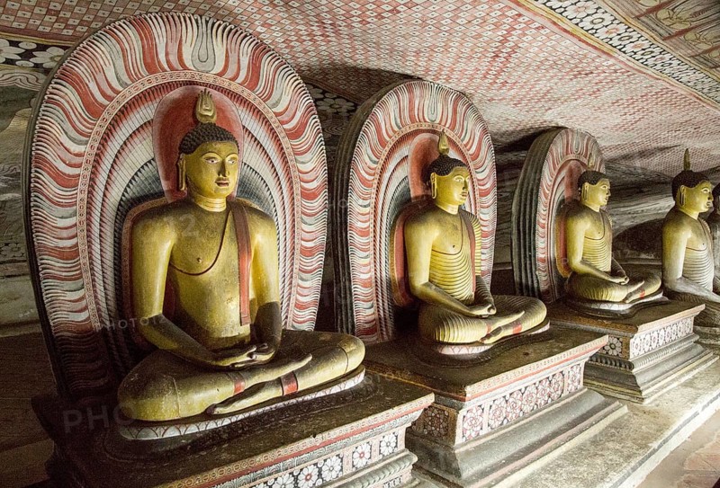 Buddha figures inside Dambulla cave Buddhist temple complex, Sri Lanka, Asia