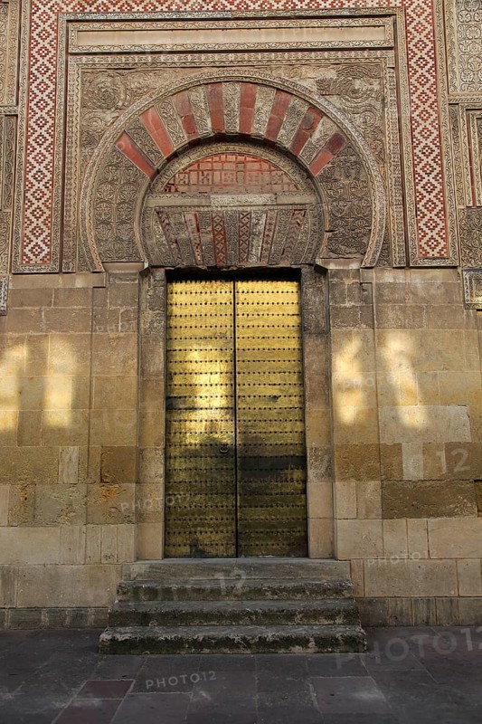 Moorish doorway arch elaborately inscribed stonework of the mezquita Great Mosque, Cordoba, Spain, Europe