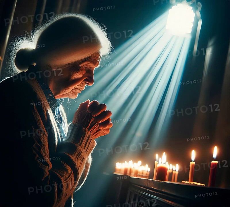 An old woman prays fervently with folded hands, Symbolic image believing, religious, prayer, AI generated, AI generated