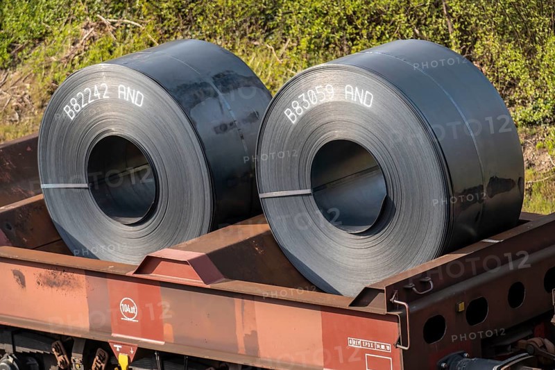 Strip steel coils, on freight wagons, at the ThyssenKrupp Schwelgern plant in Duisburg-Marxloh is part of the Bruckhausen steelworks, North Rhine-Westphalia, Germany, Europe