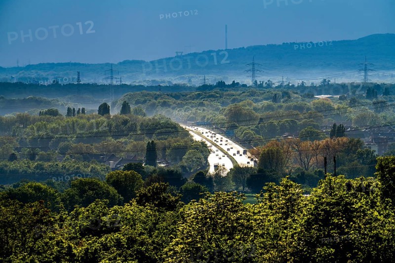 View from the Rungenberghalde, Gelsenkirchen to the west, after a rain shower, green landscape, motorway A2, in the background the slagheap Haniel in Bottrop, North Rhine-Westphalia, Germany, Europe