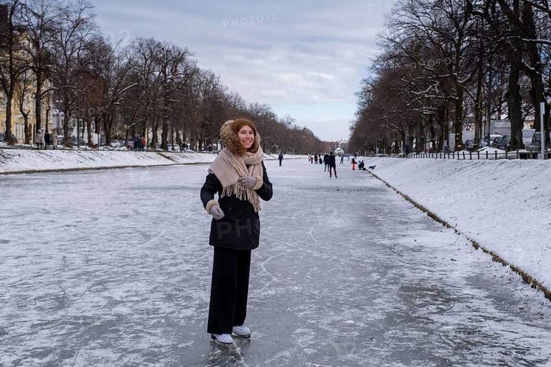 Ice skaters on the Nymphenburg Palace Canal, Nymphenburg in winter, Munich, Upper Bavaria, Bavaria, Germany, Europe