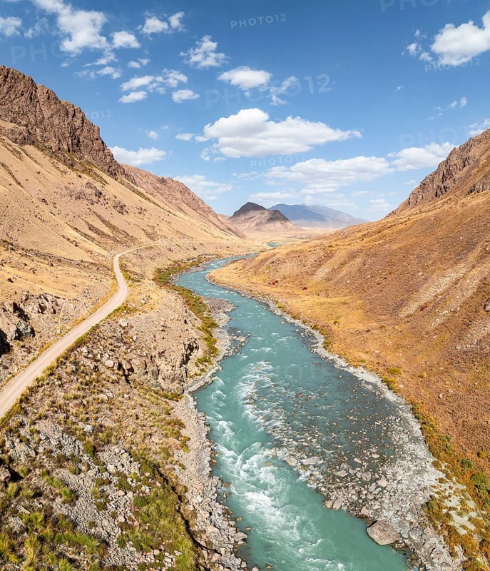 Mountain valley with wild river between hills, Bolgart Valley, Naryn Province, Kyrgyzstan, Asia