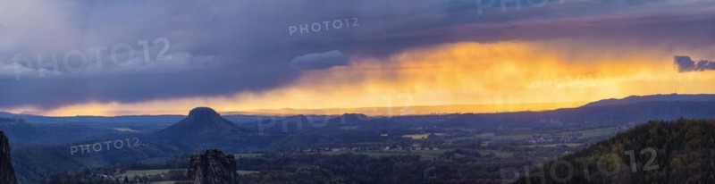 View from the Carolafelsen over Pirna to Dresden. Sunset and rain showers, Bad Schandau, Saxony, Germany, Europe
